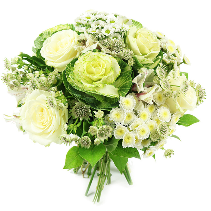 A sophisticated hand-tied bouquet in a harmonious palette of white, cream, and many shades of green is captured against a bright white background, giving it a fresh, almost weightless appearance. Dominating the composition are open, velvety white roses, each bloom fully unfurled to reveal creamy centres and layers of soft petals that look as though they have been carefully sculpted. Cradled among them are ornamental kale heads, forming striking rosettes that transition from pale, almost chartreuse centres to deeper green, more textured outer leaves; their bold presence brings a modern edge reminiscent of stylish tablescapes in Oxford's leafy North Oxford townhouses. Surrounding these key flowers are clusters of petite white spray chrysanthemums and daisy-like blossoms, each with many slender petals and subtle yellow or greenish centres, lending an easy, unforced charm. Fine sprays of greenish-white astrantia punctuate the arrangement, their delicate, star-shaped clusters introducing a slightly wild, hedgerow character, as if gathered from the lanes out toward Boars Hill. Hints of white alstroemeria add a refined touch, their elongated petals and faint striping offering another layer of interest. The foliage is plentiful and varied, ranging from deeper emerald leaves to lighter, fresher greens, enfolding the flowers in a lush, rounded halo that feels both natural and meticulously considered. All the stems are neatly aligned and bound at the base, clearly marking this as a hand-tied bouquet ready for a favourite jug or vase. The overall impression is one of understated luxury and calm, suited to weddings, anniversary dinners, or condolence flowers delivered quietly to homes and chapels around Oxford.