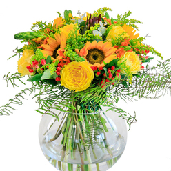 Beneath the gentle light that filters into Oxford's historic terraces, a bountiful bouquet stands radiant-a harmonious blend of sun-kissed sunflowers and buttery yellow roses, their blossoms turned outward as if seeking the sunshine spilling through a Botley window. The arrangement is enveloped in the delicate embrace of feathery ferns and lush foliage, softening the composition and inviting the senses to linger. Vivid clusters of diminutive red Hypericum berries are tucked throughout, their jewel-like tones reminiscent of the vibrant hues found in local flower markets off High Street. Light green wisps of filler and slender flower spikes add movement and freshness, echoing the wild beauty seen along the Thames Path. Hints of silvery eucalyptus inject a cool, contemporary undertone. Cradled within a clear spherical vase-the glass perfectly polished-the submerged stems intertwine in refreshing clarity, evoking transparency and groundedness. Brushing past the bouquet, one imagines the faint, uplifting fragrance, a blend of earthy greens and just-cut roses conjuring memories of open meadows beyond Oxford's city centre. This skillfully designed arrangement celebrates both the timeless joy of friendship and the cheerful energy of the local community. Whether offered for birthdays, anniversaries, or as a thoughtful gesture for a beloved neighbour, each detail expresses the expertise and care of Oxford's local florists, bringing a touch of golden countryside into any home.
