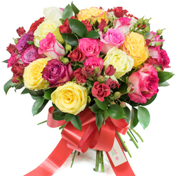 A richly hued, rounded bouquet of roses presented on a pure white backdrop, artfully combining scale and texture to create a celebratory statement. The arrangement pairs large hybrid tea roses-open and full-with sprays of smaller cluster roses and tight buds, offering visual movement from the centre outward. The colour story moves from cheerful bright yellow and soft creamy ivory through a gradation of pinks - from whisper-blush to vivid fuchsia and bicoloured pink-and-white varieties-punctuated by deep burgundy and cherry-red blooms that add depth and warmth. Dark, glossy foliage (probably ruscus or salal) weaves between the flowers, its cool green providing contrast and a living frame that makes each petal sing. The stems are bound with a broad red satin ribbon tied into a generous bow whose tails trail down, where a neat white gift tag is fastened, bearing a stylised logo and the words "Happy Holidays." The petals look plush and slightly dewy under soft lighting, suggesting a gentle citrus-tinged scent that feels fresh and uplifting rather than heavy. An experienced florist's eye is evident in the bouquet's balanced dome and tactile variety, designed to convey joy and affection for occasions such as birthdays, anniversaries, or a warm festive surprise. Flowers Oxford prepares similar bouquets for same-day delivery across Oxford, from Summertown to St Giles, ensuring each arrangement arrives bright and ready to delight.