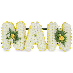 A tender, carefully considered floral tribute spells 'MAM' in three bold capital letters, designed to honour a cherished grandmother or mother with softness and dignity. Each letter is composed of a dense mat of small white chrysanthemum spray flowers, their tiny petals creating a plush, cushion-like surface that reads as clean and serene. The perimeter of every letter is crisply defined by a bright, sunny yellow pleated ribbon that wraps the edges, offering a polished frame and a warm visual lift against the white blooms. At the leftmost 'M' and the rightmost 'M' sit intimate accent clusters: a centrally placed yellow rose, its petals still gently furled, is accompanied by delicate white freesia or similar white buds and slender dark green fern fronds layered with glossy foliage, introducing a cool, verdant contrast. A discreet dark green support bar runs behind the tops of the letters, keeping the trio steady for display at a memorial service, whether at St Giles, a small chapel near the Covered Market, or a family graveside in Iffley. The photograph presents the piece on a pure white backdrop so the crisp whites, warm yellows and deep greens read without distraction. As a local florist at Flowers Oxford, I source flowers fresh from local growers when possible and arrange with the care families expect in Oxford and surrounding neighbourhoods such as Jericho and Summertown. The overall impression is one of reverent warmth-an expressive sympathy tribute that speaks of purity, sunshine and enduring affection for a beloved mother figure.