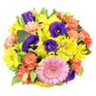 Photographed from above on a bright white surface, this hand-tied mixed bouquet appears as a radiant circle of colour and texture, balanced with the care of a seasoned Oxford florist. A large, softly blushing pink gerbera daisy commands the focal point, its petals perfectly layered around a textured greenish-yellow centre that seems to glow. Surrounding it, abundant yellow chrysanthemum daisies form clusters of sunshine, their slim, elongated petals splaying outward like little bursts of light that could easily brighten a rainy day by the Isis. Threaded amongst them, rich purple lisianthus blossoms bring a velvety depth; some are fully open, cupping delicate stamens, while others remain partly closed, adding an intriguing mix of shapes and stages of bloom. Coral-orange carnations ripple through the bouquet, their frilled petals and dense heads introducing a soft, cloud-like feel and a sense of celebration akin to festival colours on Broad Street. Lush greenery, highlighted by a few variegated leaves with creamy white edges, provides a cool, fresh backdrop, making every warm hue stand out clearly. The bouquet is tightly packed, with almost no gaps, giving an impression of generosity and abundance. The lighting is clean and even, making each detail-every curve, vein, and petal edge-clearly defined, as if the flowers have just been conditioned and arranged for same-day delivery across Oxford. The overall mood is uplifting, ideal for birthdays, get-well wishes, or simple thinking of you moments, sending a bright, modern splash of floral joy to homes and offices from Botley to Headington.