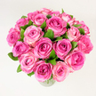 A lush, tightly packed bouquet of roughly two dozen fresh pink roses sits in a simple clear glass vase against a clean, evenly lit white background. Each rose is open or nearly open, the velvety petals layered in concentric spirals that move from deeper fuchsia and magenta in the heart of some blooms to gentler rosy-pinks and blush tones at the outer edges, creating a soft, natural ombré across the cluster. Dark, glossy green leaves are tucked between heads and peek out at intervals, their cool, slightly serrated textures offering a vivid contrast to the warm pinks and reinforcing the sense of freshness. The photograph is taken from a slightly elevated, overhead angle that emphasizes the bouquet's rounded, generous silhouette and the dense, almost pillow-like surface formed by the many petals. Soft, diffuse daylight washes the scene evenly, picking out the subtle satiny sheen on each petal and suggesting a faint, powdery rose scent that seems to hover in the air. The composition feels both classic and intimate - a design that speaks of celebration, devotion, and quiet tenderness, perfect for Valentine's Day, an anniversary, or a thoughtful Mother's Day gift. As a local touch, imagine this arrangement being collected at Oxford's Covered Market or placed on a dining table after a stroll through University Parks; the colourway and craftsmanship pair beautifully with the pale stone architecture and springtime light of central Oxford. The overall impression is one of abundant, hand-tended beauty that invites touch, scent, and the simple joy of fresh flowers.