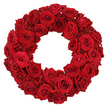 On a pristine white background, a stunning wreath unfolds, crafted entirely from dozens of deep red roses. The circular form is dense and plush, each bloom pressed gently against the next to create a continuous ruby surface that glows with quiet intensity. Some roses stand in full bloom, their velvety petals unfurling in luxurious spirals, while others remain in tight buds, hinting at tomorrow's radiance. The petals' folds catch the light, revealing subtle variations in crimson and wine, giving the arrangement depth and tactility even at a glance. There is no greenery to distract from the rose's classic silhouette, so the viewer's eye moves along the ring, savoring the texture of each petal and the perfume that would linger in the air. This design speaks of love and remembrance, of celebrations both joyful and solemn, and is a versatile focal point for occasions across Oxford-from intimate dinners at North Oxford terraces to ceremonial gatherings near the University Parks. For those seeking same-day delivery around Oxford, Flowers Oxford can bring this crimson crown to doors with care, preserving its crisp, clean presentation against a stark, appreciative backdrop of white. The wreath's craftsmanship-tight, precise spacing, seamless curvature, and a velveteen finish-speaks to a florist's patient artistry and intimate knowledge of seasonal roses, making it not just an arrangement but a little piece of enduring sentiment. It invites touch, memory, and quiet reflection.