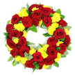 A round funeral wreath composed of red roses and yellow chrysanthemums is shown in sharp detail against a spotless white background, every bloom and leaf clearly visible. The arrangement forms a perfectly symmetrical ring with an open centre, the edge built from closely placed deep red roses whose velvety petals swirl inward in elegant spirals. Some roses appear a rich, classic crimson, while others deepen toward burgundy, creating a gentle play of light and shadow across the wreath. Interlaced between these are generous clusters of bright yellow chrysanthemums, their finely ruffled petals forming soft domes of colour that bring light, warmth, and a sense of gentle comfort to the design. Supporting the flowers is a foundation of mixed greenery: smooth, dark green leaves with a slight sheen provide structure and fullness, while paler, grey-green leaves with a softer texture recall eucalyptus, adding a cool, restful tone. The foliage fills any gaps without overwhelming the blooms, ensuring the circle remains visually continuous and symbolically unbroken, a common choice for expressing eternal love and remembrance. The even lighting highlights the purity of the colours, making the arrangement feel fresh, as if prepared that morning by a skilled Oxford florist for a service in a local church near Cowley Road or a quiet farewell at Wolvercote Cemetery. The overall impression is of a carefully considered, traditional tribute, balancing the depth and solemnity of red with the optimistic glow of yellow, suitable for funerals, memorial gatherings, or laying at a graveside in honour of a cherished life.