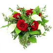 In this image, a graceful bouquet of red roses and white calla lilies stands proudly in a clear glass vase, positioned against a seamless white background that emphasizes its rich colours and sculptural form. At the centre, around six to seven red roses are in full bloom, their petals densely packed and velvety, unfolding in deep crimson spirals that speak of warmth, devotion, and classic romance. Rising between the roses, four to five white calla lilies introduce a serene counterpoint, each bloom a long, flaring trumpet with smooth, creamy petals that curl gently back to reveal a slender yellow-orange core. Surrounding these focal flowers is a generous layer of greenery: eucalyptus with its rounded, silvery-green leaves provides a feathery lightness and soft movement, reminiscent of the breezy paths along Oxford's Port Meadow, while larger, darker emerald leaves nestle at the base, offering structure and a sense of fullness. The flowers' stems are neatly gathered in a cylindrical glass vase with a subtle ribbed detail near the bottom, the clear water and overlapping green stems visible through the glass, reinforcing a feeling of freshness and professional care. The lighting is bright yet soft, illuminating every curve of the calla lilies and every petal edge on the roses, and making the greens appear vivid and alive. This arrangement feels perfectly suited to an anniversary dinner in Summertown, a romantic surprise delivered across central Oxford, or a refined focal piece for a special celebration, radiating quiet sophistication and heartfelt sentiment from the first glance.
